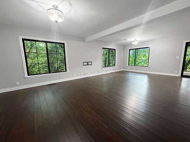 Building Photo - Modern Lake Lanier Retreat | 3BR/3.5BA | Private Swim Dock