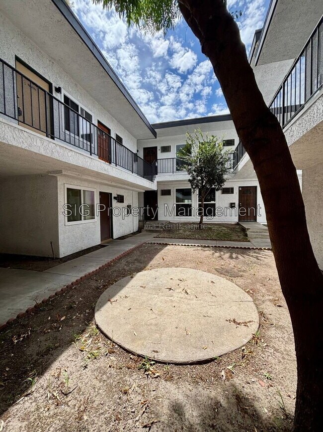 Building Photo - 10635 Sherman Grove Ave