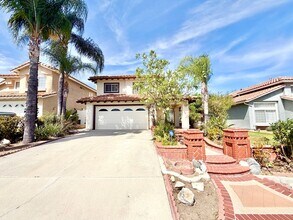 Building Photo - Spacious 5 Bedroom 3 Bathroom Home with Updated Paint, New Roof & Private Balcony