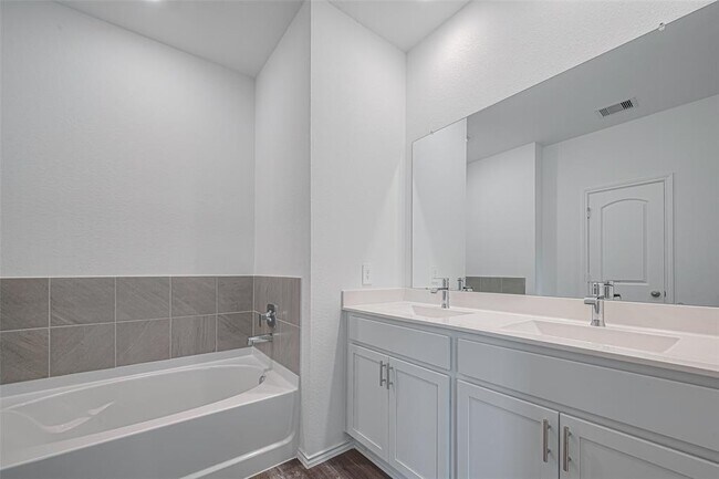 Building Photo - 27306 Sunterra Village Dr