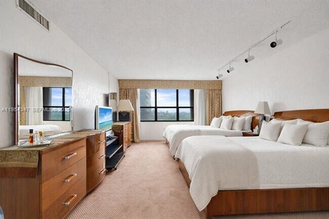 Building Photo - 9801 Collins Ave