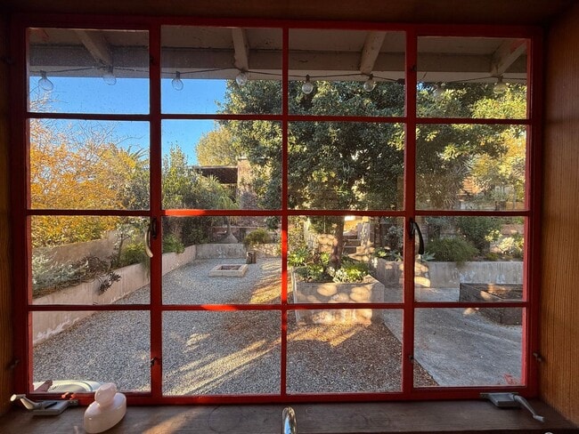 Building Photo - Hilltop Highland Park Sanctuary with Views, Private Gated Yard, In Unit Laundry, Parking & Abunda...