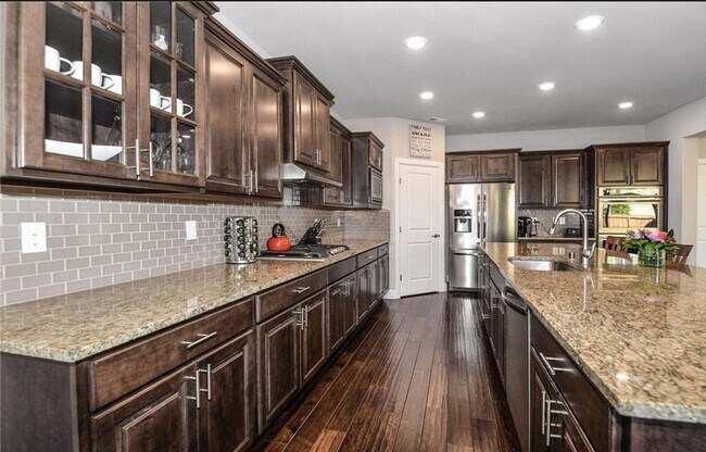 Building Photo - Gorgeous 4BR Home in Canton Park Backing t...