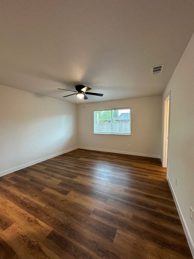 Building Photo - Updated Home with Island Kitchen, LVP Flooring, and Yard Care Included!