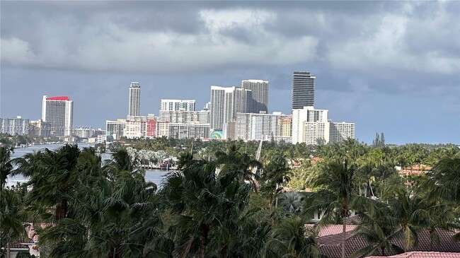 Building Photo - 19390 Collins Ave