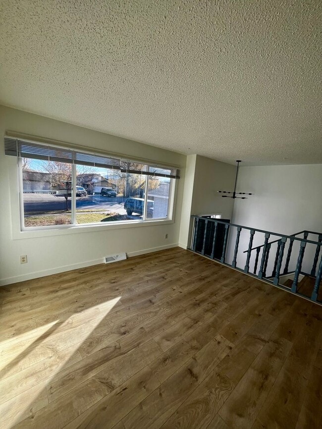 Building Photo - Fully Renovated 4-Bedroom Home, Plus an Office & Two Living/Family Rooms in Prime Bozeman Location