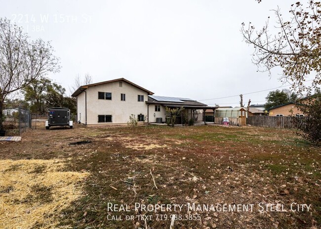 Building Photo - Spacious 5-Bedroom Home with Solar Panels ...