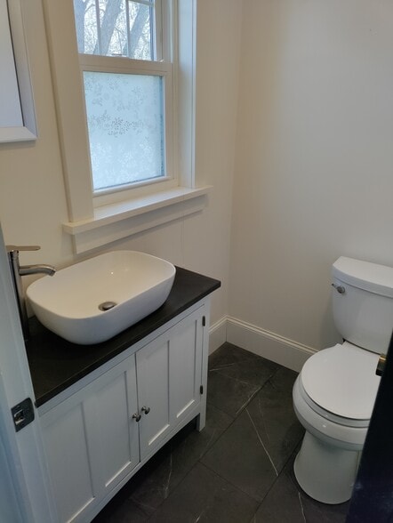 half bath off kitchen - 403 W 1st St