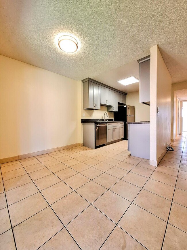 Building Photo - Beautifully Remodeled Second Floor Condo Across From Pool