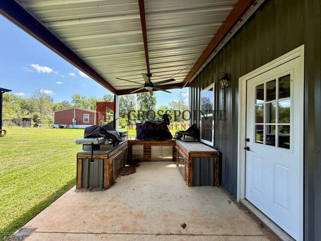 Building Photo - Tour Today! Spacious 4-Bedroom Home with Large Metal Building & Outdoor Kitchen