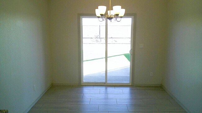 Building Photo - Immaculate Single Level Northeast Home With Refrigerated Air Located In Quiet Neighborhood