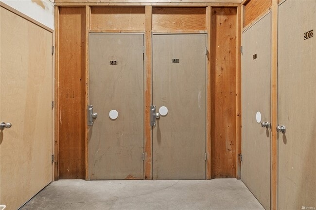 Your own dedicated storage unit with ample shelving and bike hooks - 730 Bellevue Ave E