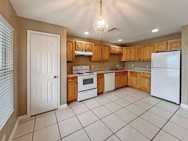 Building Photo - Your Duplex Dream Just Got Merrier! Charmi...