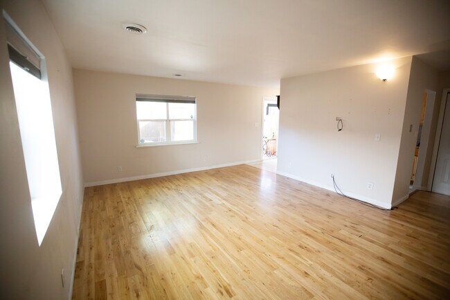Living room with hardwood floors - 4029 Wyandot St