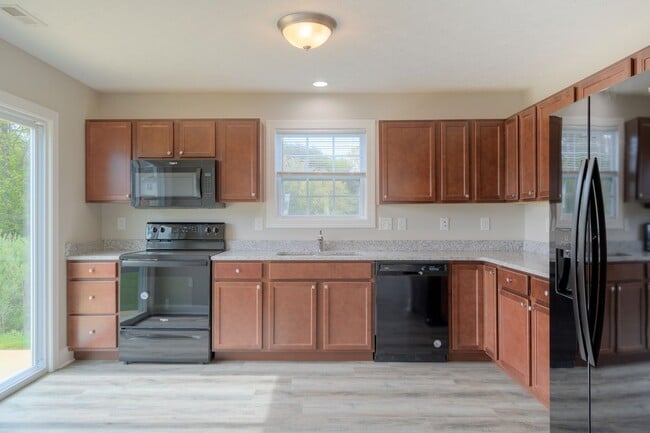 Building Photo - More units and move-in options available.