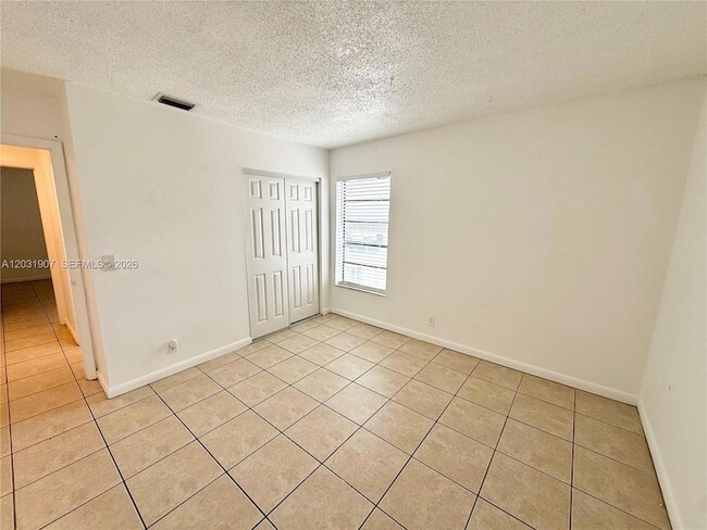 Building Photo - 2410 NW 52nd Ave