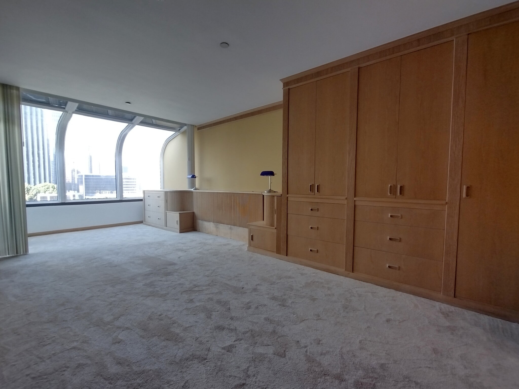 Master bedroom with custom cabinets - 121 S Hope St