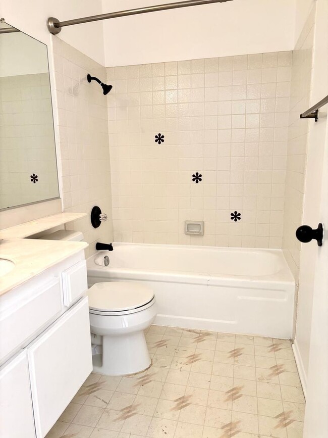 Building Photo - Available Now is a Condo style Townhouse i...