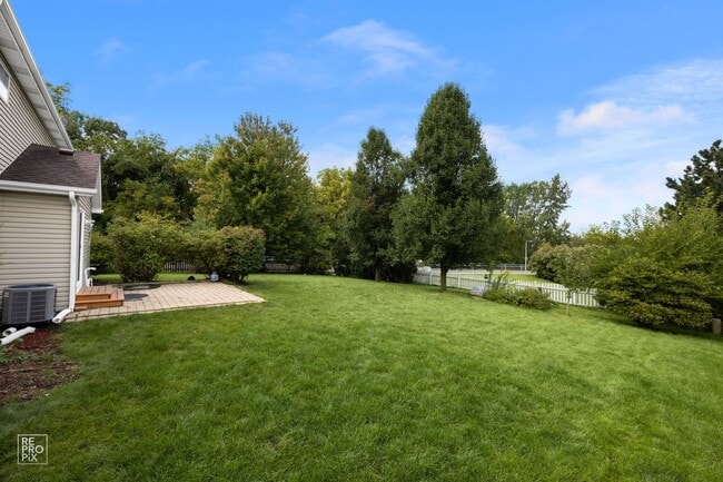 Building Photo - Aurora Four Bedroom Home with Fenced Yard ...