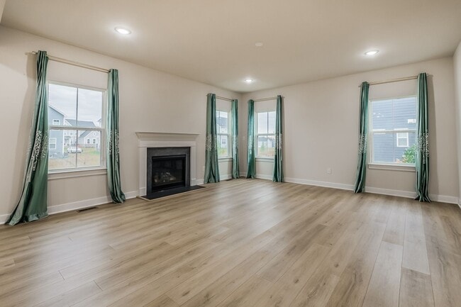 Building Photo - 2023 Hartland Stunner—6BR with 3-Car Garage