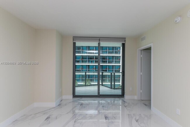 Building Photo - 1300 S Miami Ave