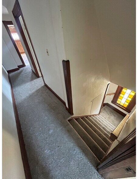 Hallway connecting both bedrooms - 209 1/2 Maple St