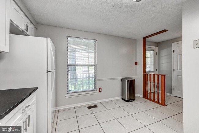 Building Photo - 8125 Greenspring Vly Rd