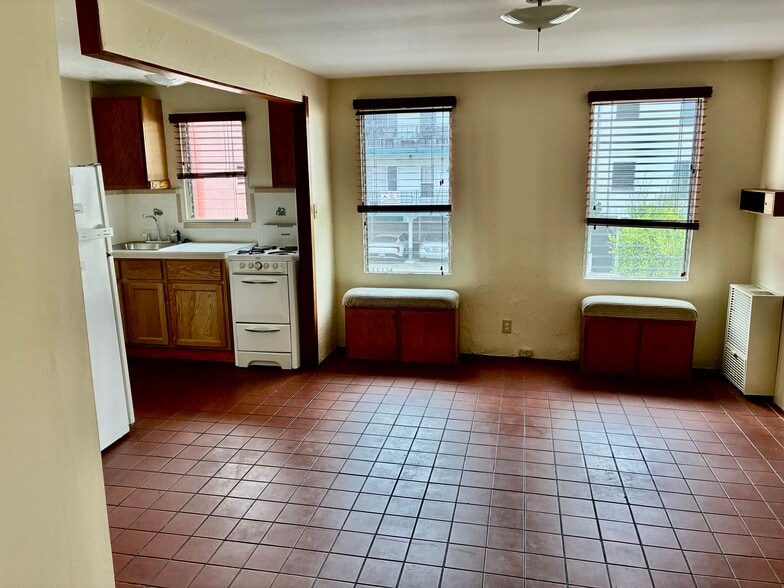 Living area with kitchen looking North - 1001 N Sierra Bonita Ave