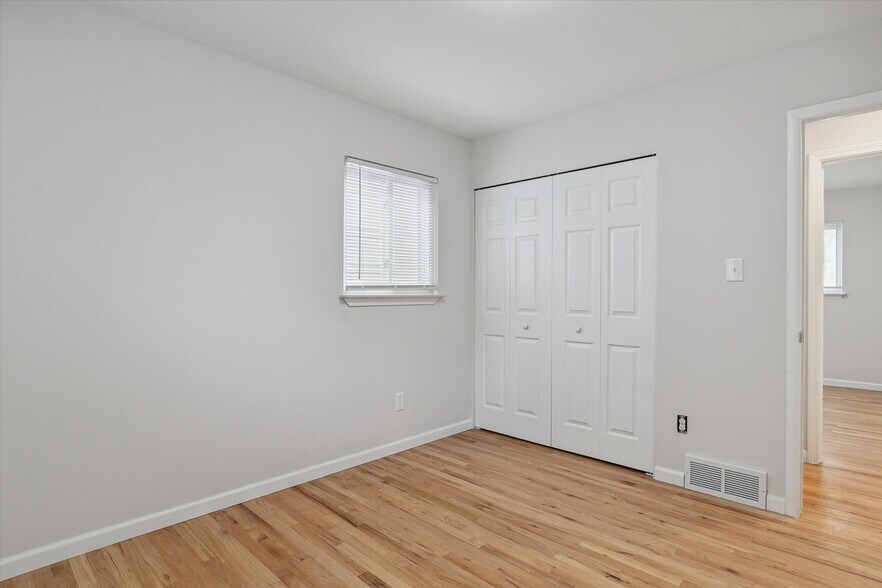 First bedroom doublewide closet. - 9244 Northern Ave