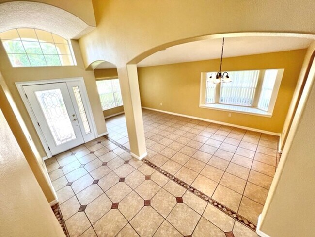 Building Photo - EAGLE CREEK LAKE NONA! WELCOME HOME! Beautiful water views! Spacious 2 story-3 bedroom 2.5 bath h...