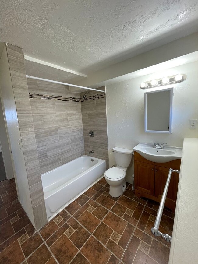 Building Photo - West Jordan Remodeled Four Bedroom; Garage; New Kitchen Cabinets; Fenced Yard; Central Air