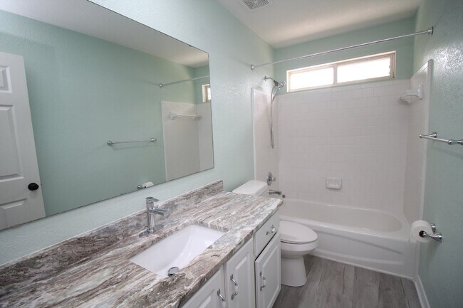 Building Photo - Updated Fox Hollow 3BR Home Near 9 Mile Rd with LVP Flooring, Granite Kitchen, 2-Car Garage & Fen...