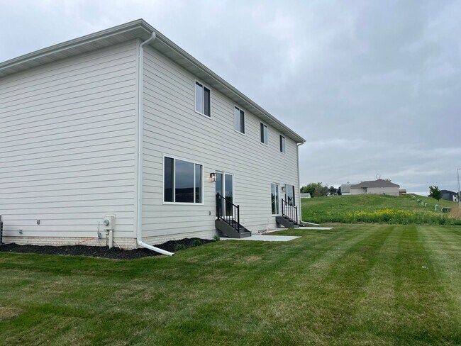 Building Photo - Spacious 5-Bedroom Duplex Near Asbury Elementary with Finished Basement & Full Amenities