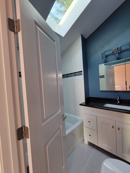 Full bath with tub and shower - 336 N 73rd St