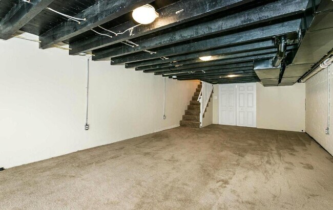 Building Photo - Charming 2bdrm 2.5 bath Patterson Park home with parking and rooftop deck