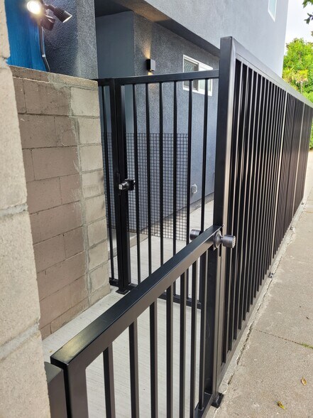 Entry Gates with combination lock door knobs. Ring Video on schedule for installation - 3355 Virginia Ave