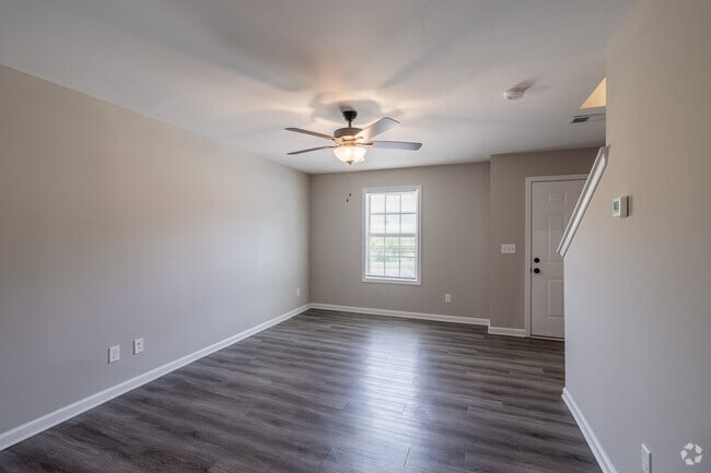 2BR, 2.5BA - 1,075SF - Living Room - Amberjack Court Townhomes