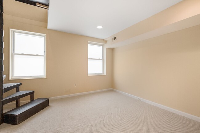 Building Photo - Spacious 2BR/2.5BA Townhome with Finished Basement & Extra Storage