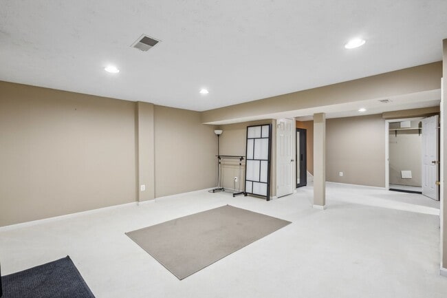 Building Photo - Modern Brick End-Unit Townhome with Stunning Upgrades and Serene Wooded Views