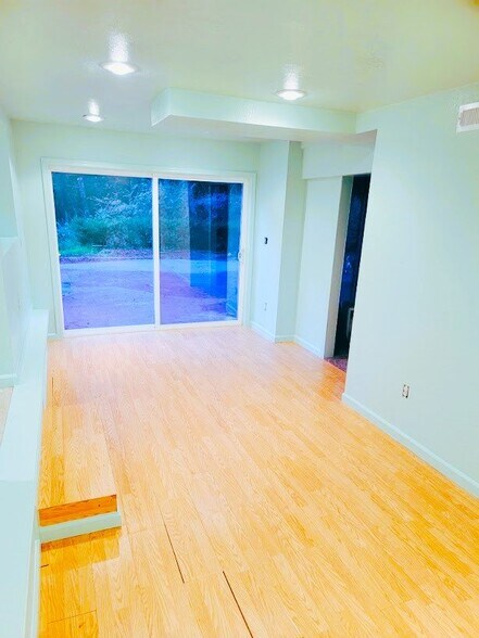 Livingroom large sliding glass door for extra light - 244 McKee Rd