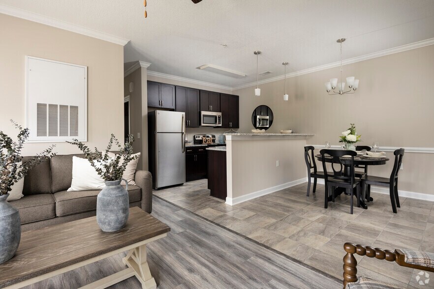 2BR, 2BA - 1,139SF Living Room / Kitchen - Palisades at Langley Pond