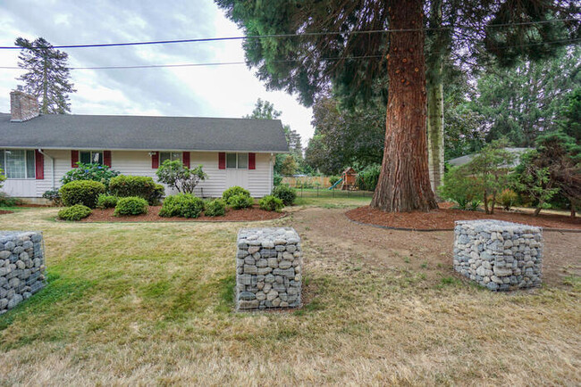 Building Photo - BEAUTIFUL LANDSCAPED THREE BEDROOM WITH BO...