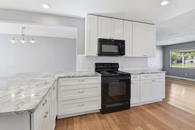 Building Photo - $3,045.95, 3 bed, 2 bath house in Denver with Fenced in Yard and In Unit Laundry!