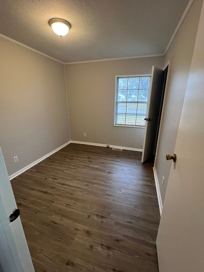 Building Photo - Four Bedrooms So Everyone Can Finally Have Their Own Door to Slam!