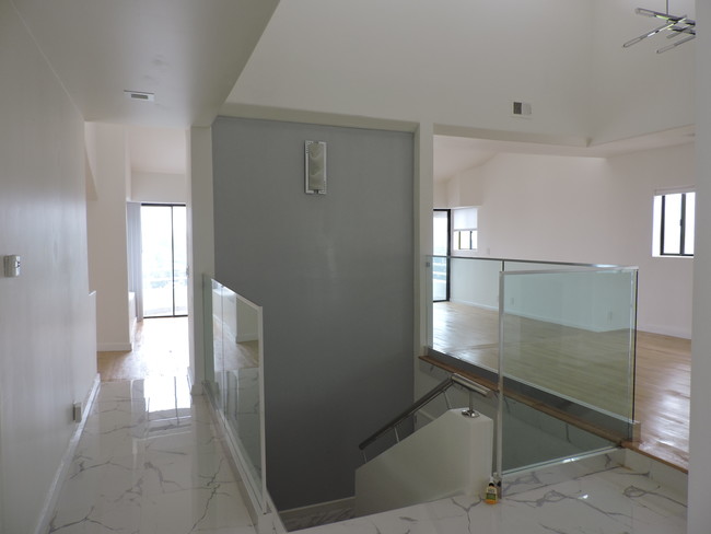 stairs down to bedrooms - 5226 Medina Rd