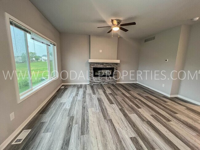 Building Photo - Spacious 3 Bedroom, 3 Bath Home with Fireplace, Deck & Walkout Basement
