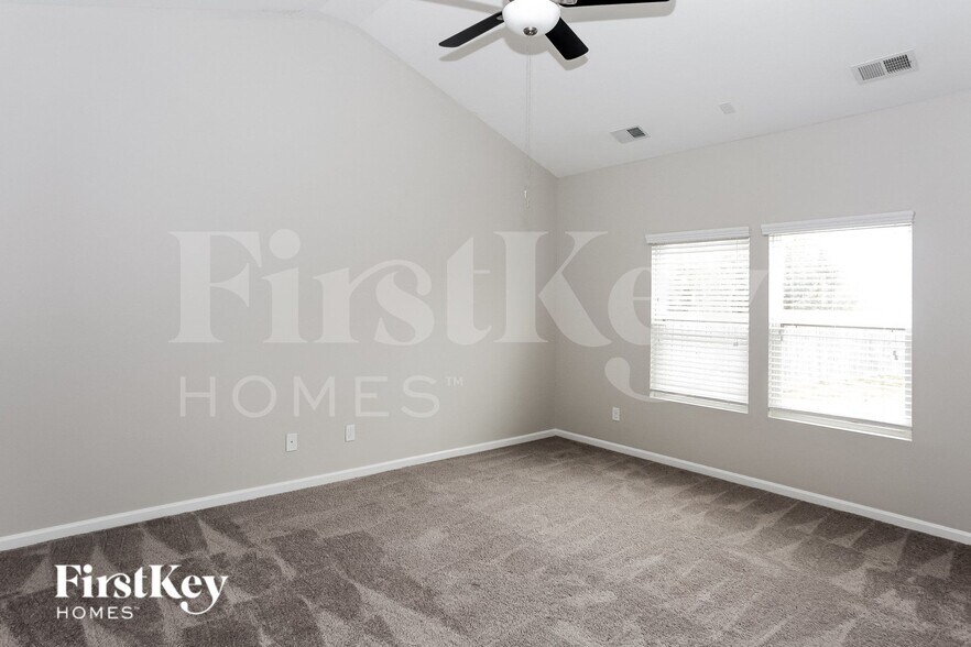 Building Photo - 6906 Barefoot Forest Dr