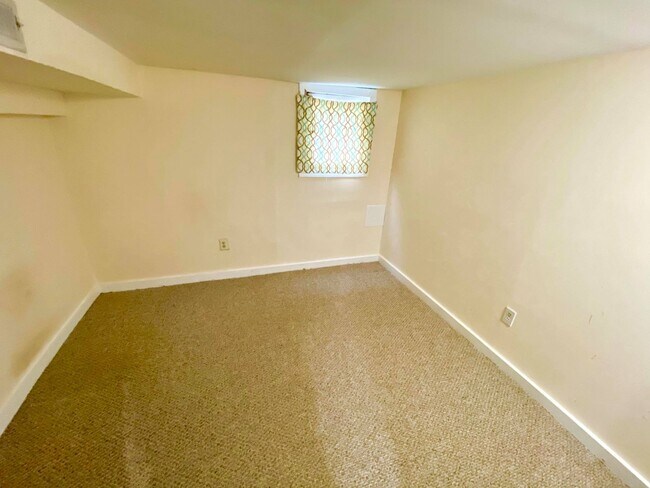 Building Photo - Charming 1BR with 1.5 Baths and Bonus Basement Room in the Heart of Ridgley’s Delight