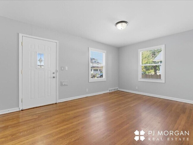 Building Photo - Stylish Updates + Spacious Yard + 2-Car Ga...