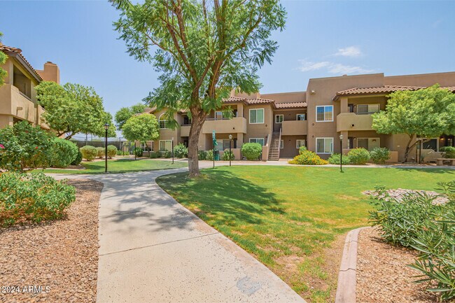 Building Photo - 9450 E Becker Ln